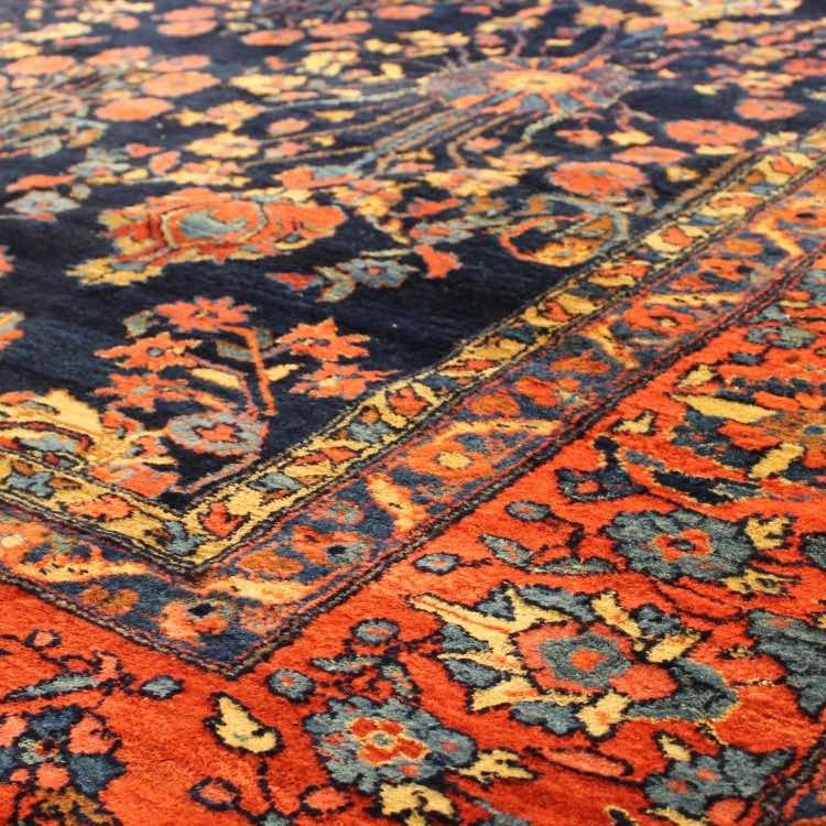 Freshly cleaned rug being delivered and laid back in a customer's home